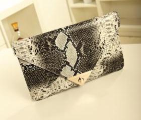 Fame Tight Woven Envelope Clutch Bag